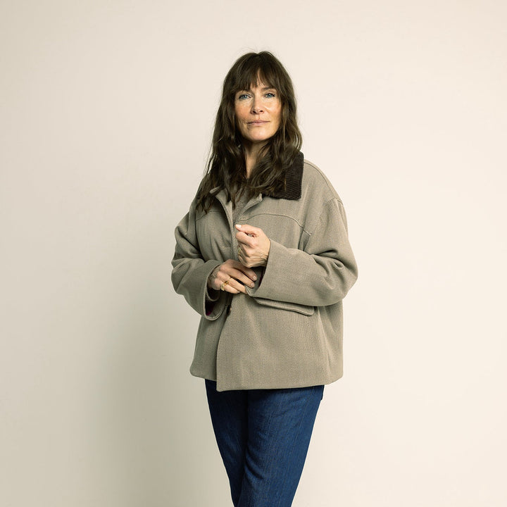 Woman modeling a Car Coat Sewing Pattern in a relaxed fit, perfect for layering and casual wear.