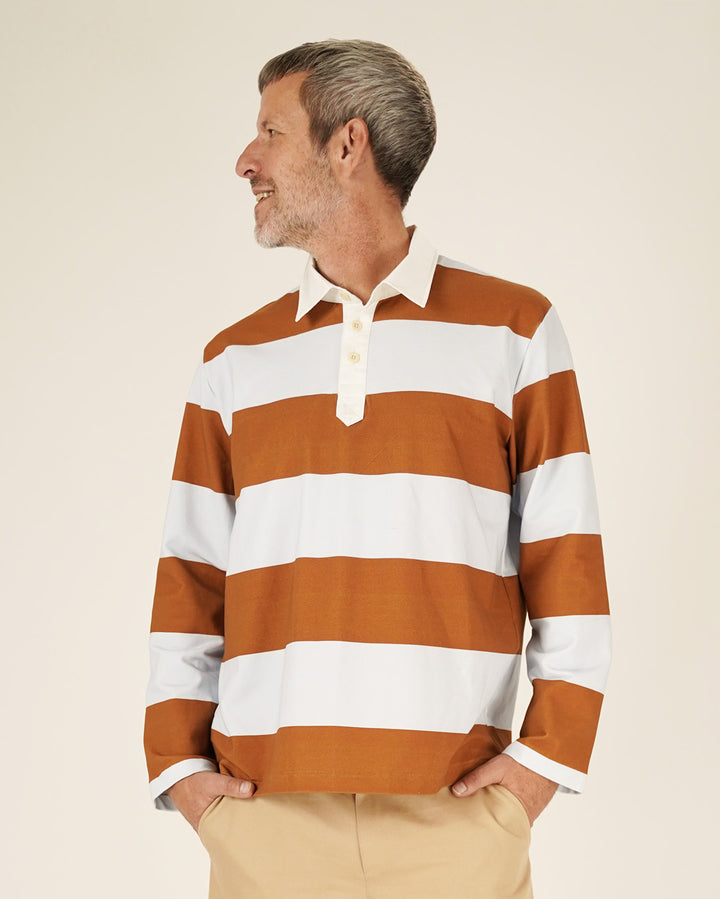 Rugby Polo Shirt sewing pattern showcased on a model wearing a striped shirt with a collar and buttons.