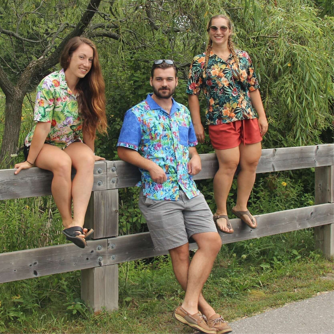 Models showcasing the Tropicana PDF sewing pattern in colorful tropical shirts during a summer outing.