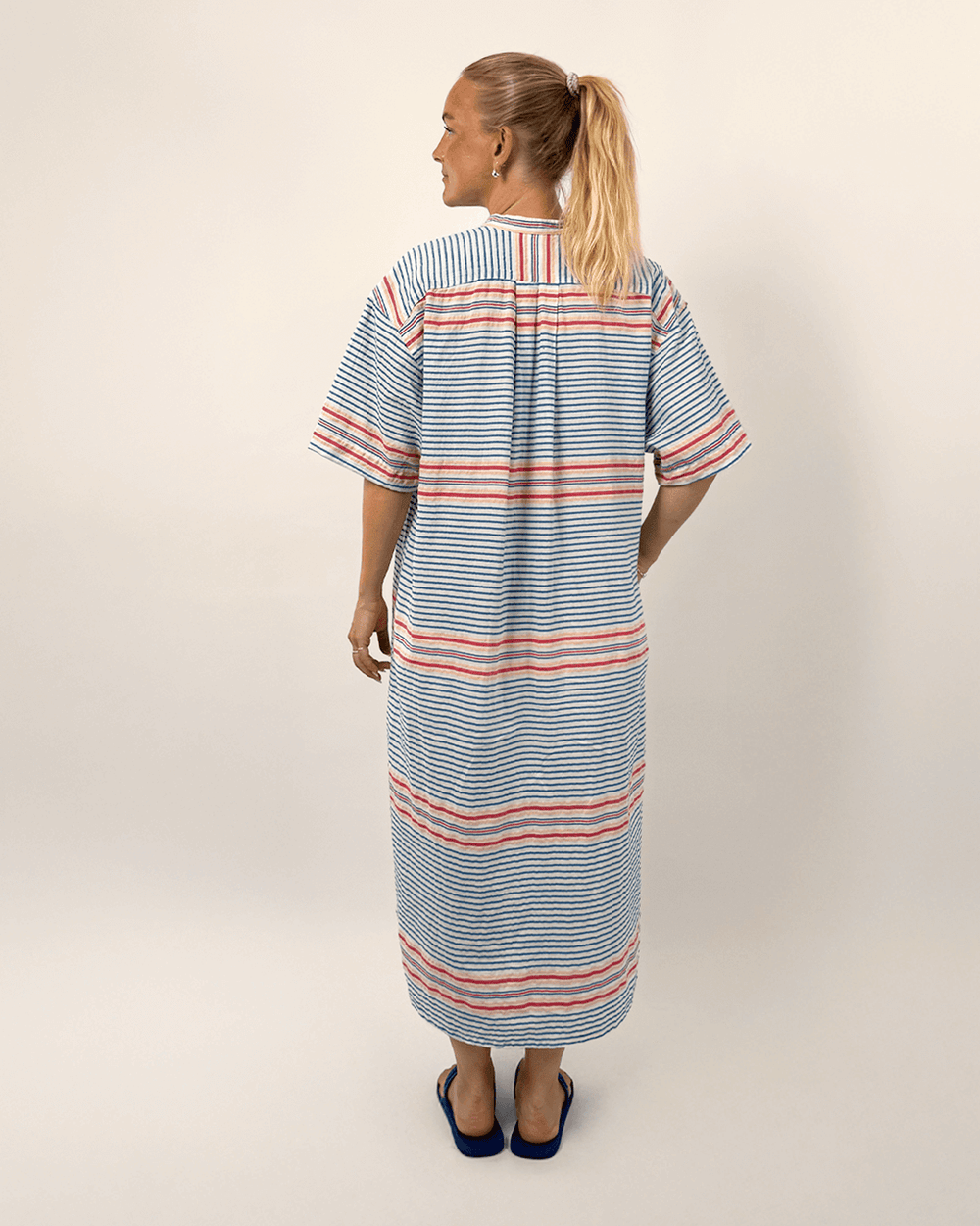 Big Shirt Paper Pattern displayed on a model from the back, featuring blue and white stripes with pink accents.