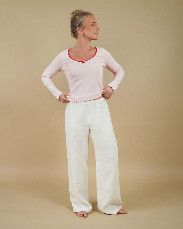 Woman wearing the Camisole Top and High Waist Pants sewing pattern, front view