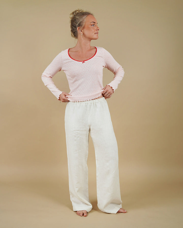 Woman wearing the Camisole Top and High Waist Pants sewing pattern, front view