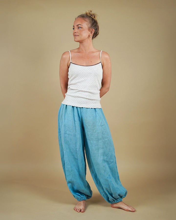 Woman wearing the Carma Camisole and Bubble Pants sewing pattern, front view