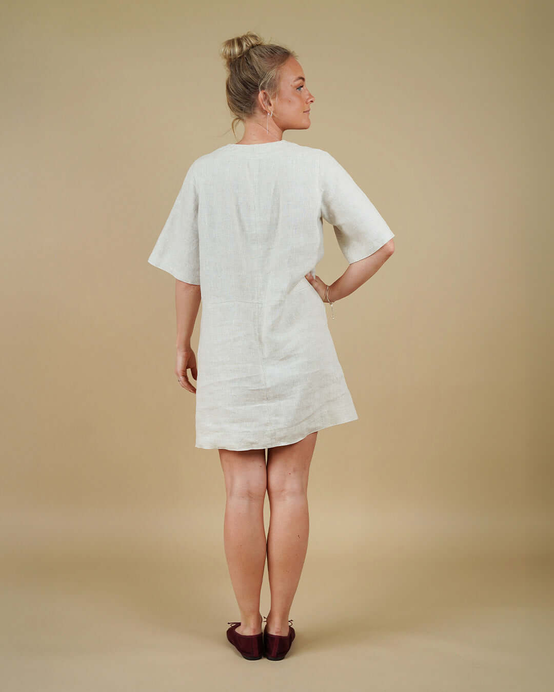 Woman wearing the City Dress sewing pattern, back view