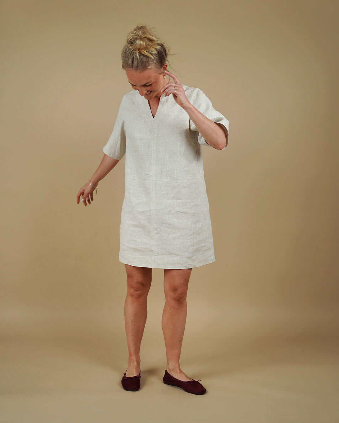 Woman wearing the City Dress sewing pattern, front view