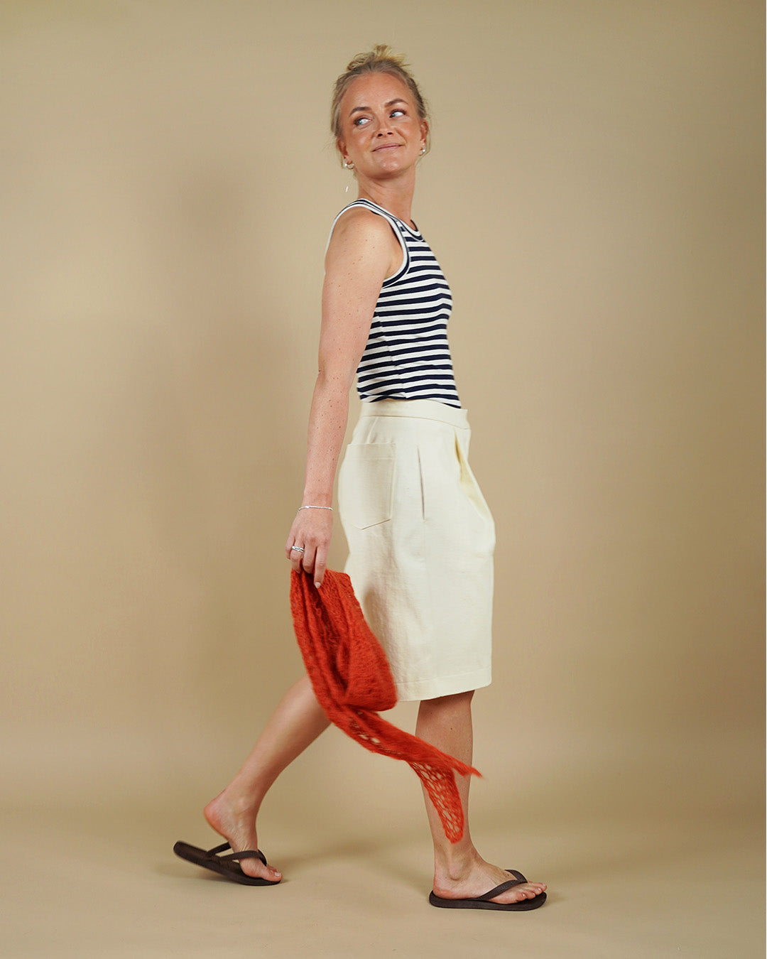 Woman wearing the Muscle Tank and Bermuda Shorts sewing pattern, side view