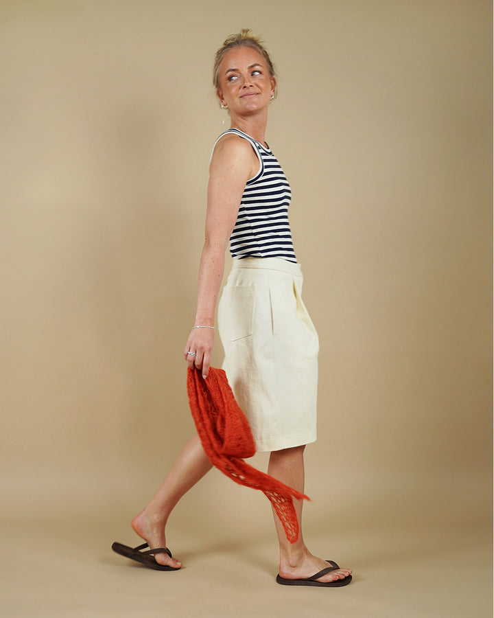 Woman wearing the Muscle Tank and Bermuda Shorts sewing pattern, side view