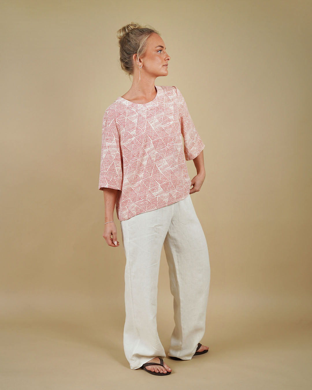 Woman wearing the Silke Blouse and High Waist Pants sewing pattern, front view